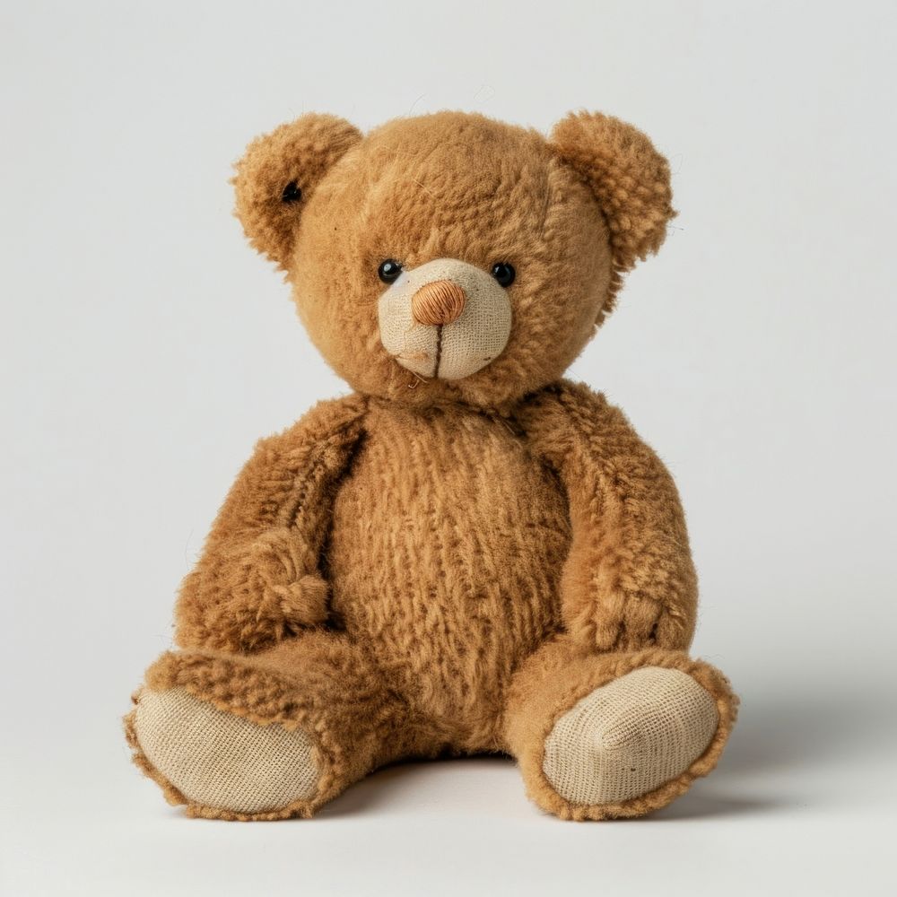 Brown bear doll toy white background representation.