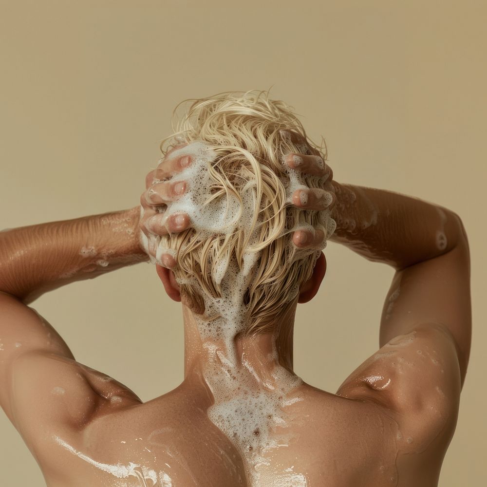 Man washing his blonde hair bathing person human.