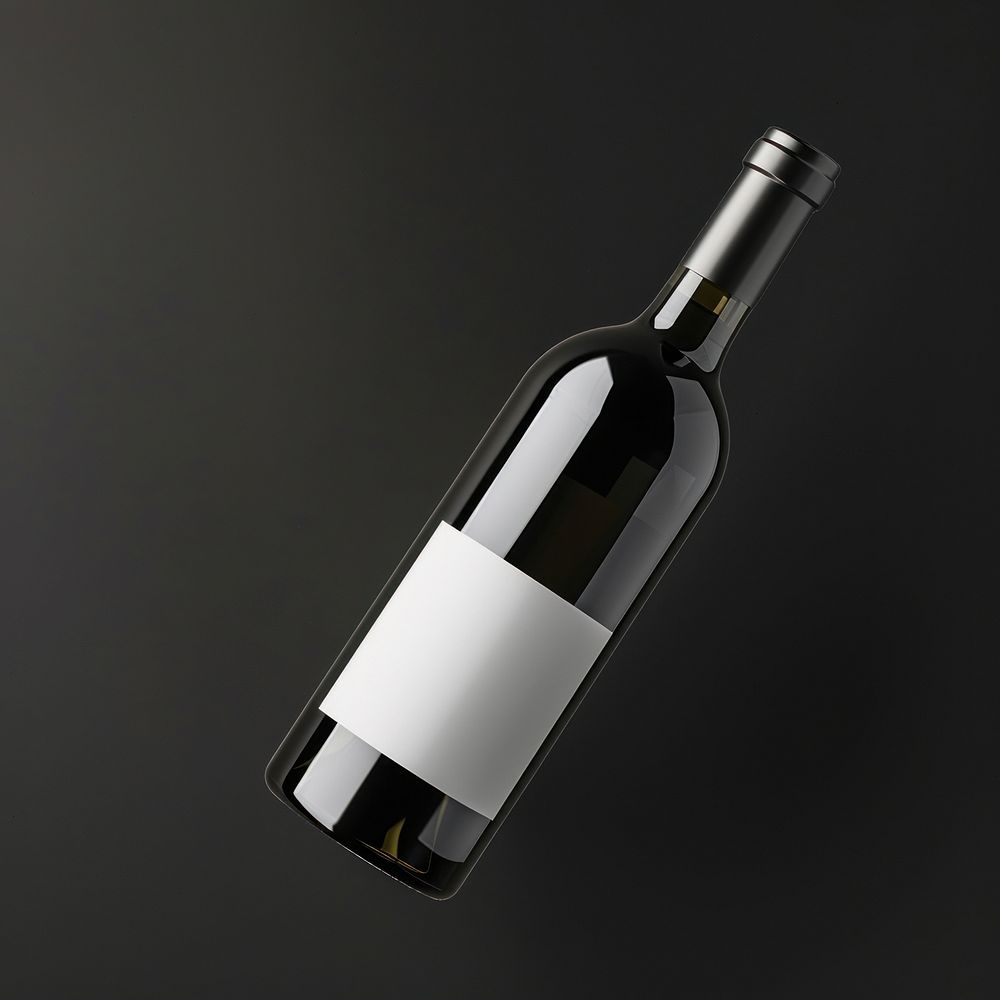 Wine bottle with white label glass drink black background.