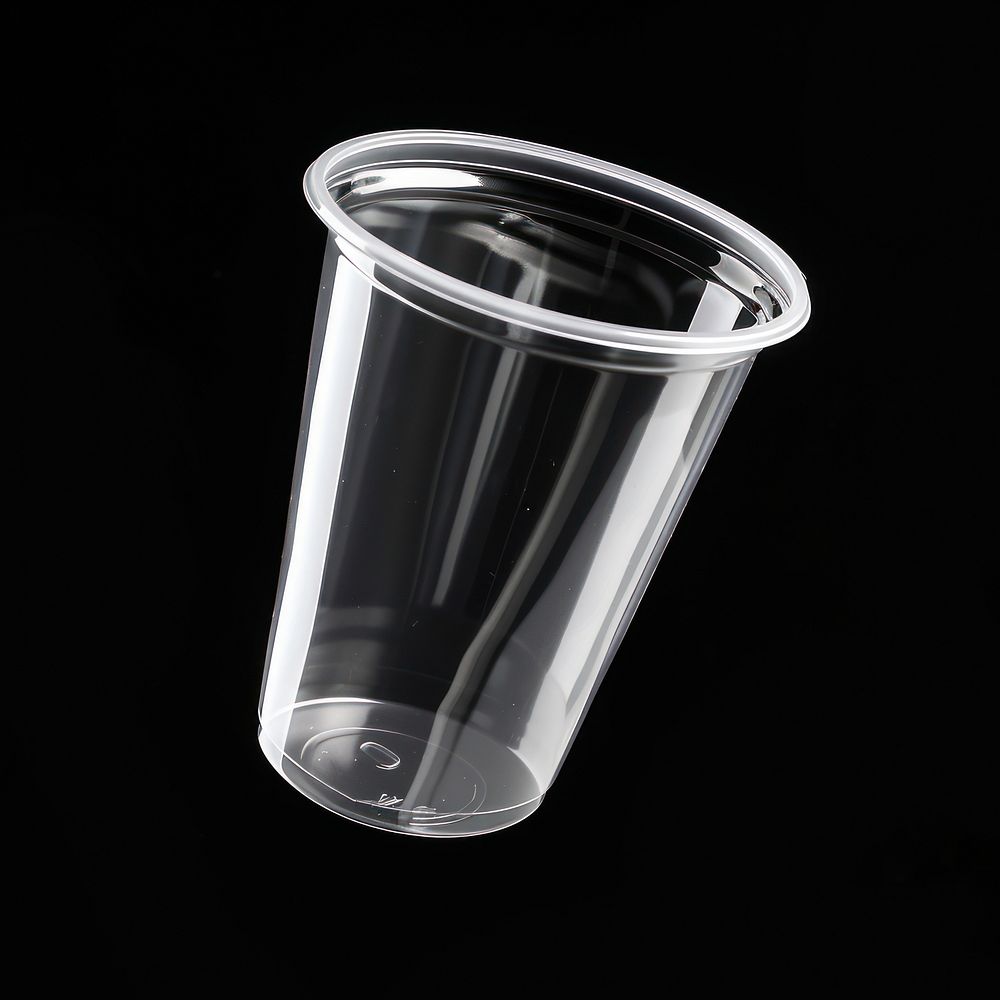 Translucent plastic cup glass black background transparent.