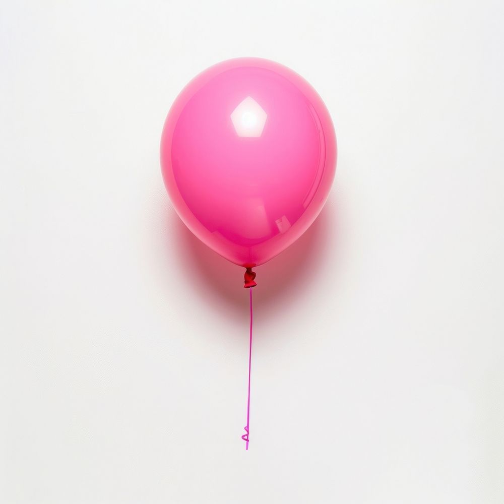 Pink balloon white background anniversary celebration.