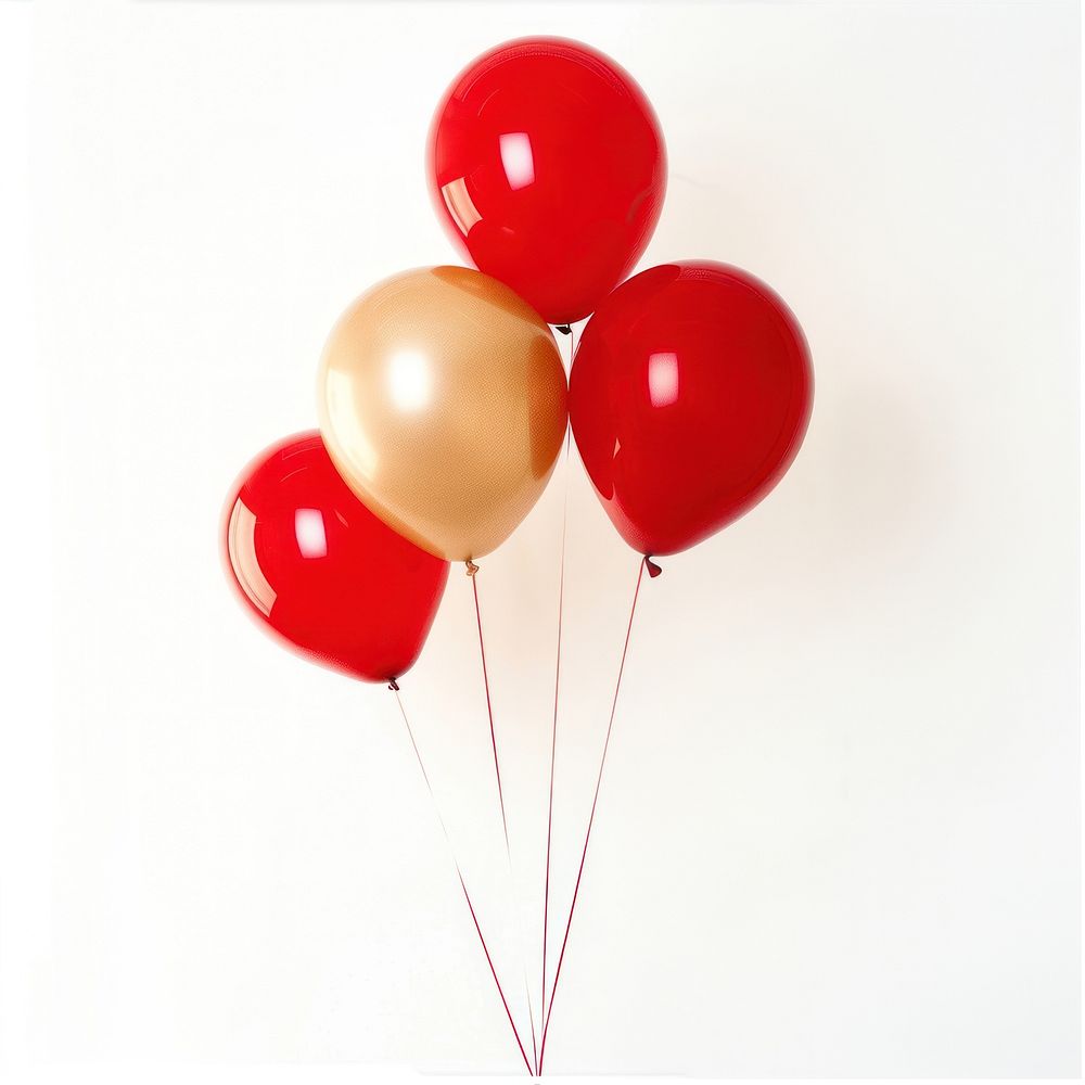 Golden and red balloons white background anniversary celebration.