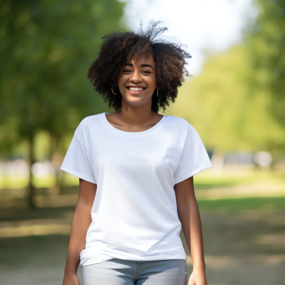 Black woman wearing white over size t-shhirt happy clothing apparel.