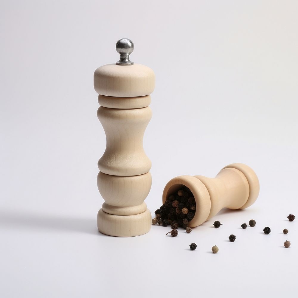 A beechwood pepper mill chess chessboard simplicity.