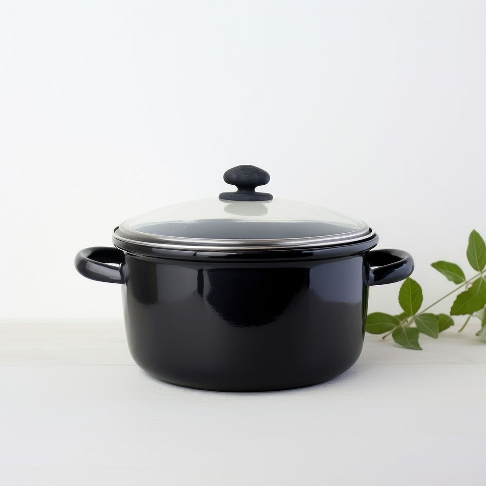 A black retro soup pot with glass lid appliance cookware saucepan.