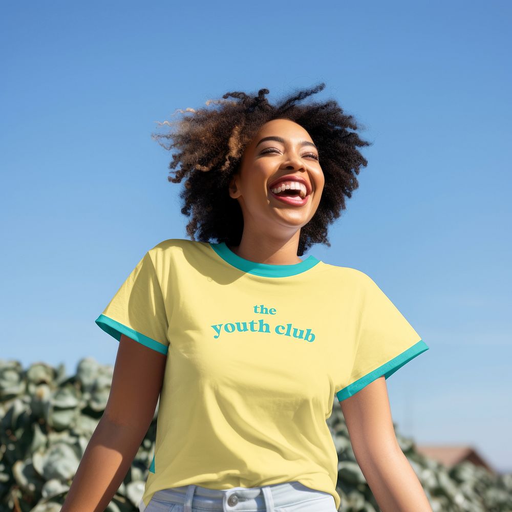 Happy African American woman in yellow t-shirt