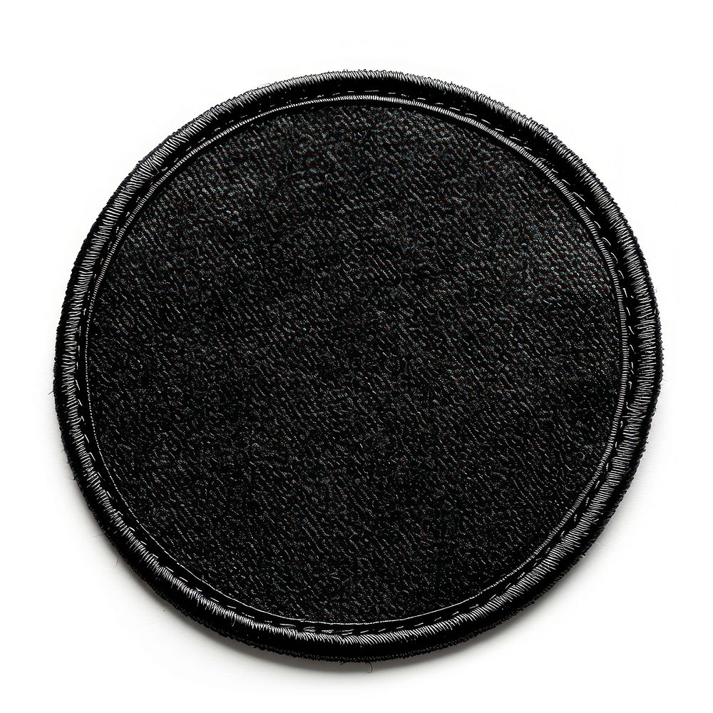 Black and white electronics camera lens lens cap.