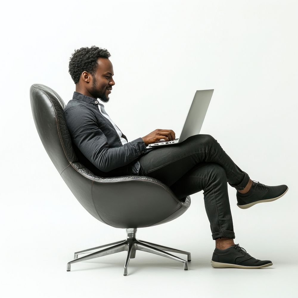 Man cheering laptop chair sitting.