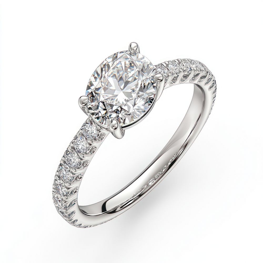 An Oval-cut diamond engagement ring with a diamond band in white gold accessories accessory jewelry.