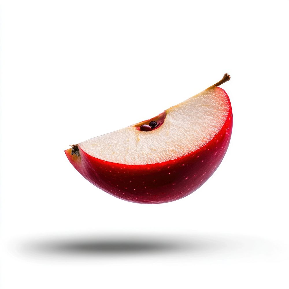 An isolated red apple slice floating fruit minimalist background.