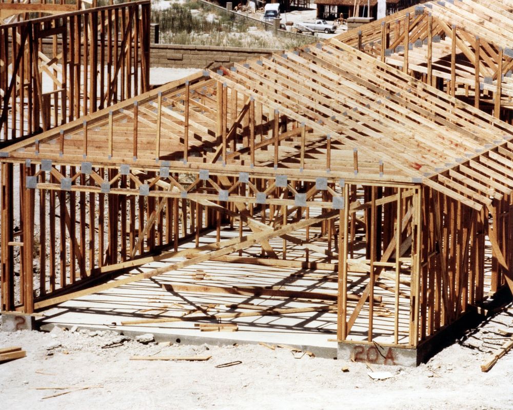 Building under construction showing truss roof.