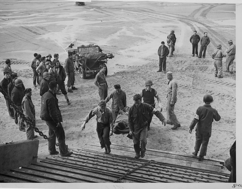 From off road car to LST in France, WWII. [Litters. Transport of sick and wounded.] [Boats.] [World War 2. European…
