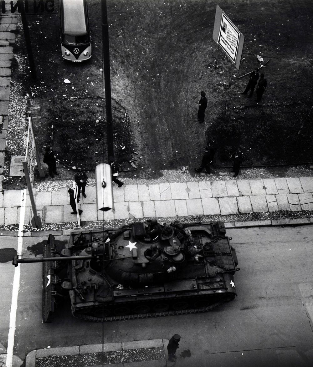 U.S. tank crew stands guard at Checkpoint Charlie in West Berlin. Original public domain image from Flickr