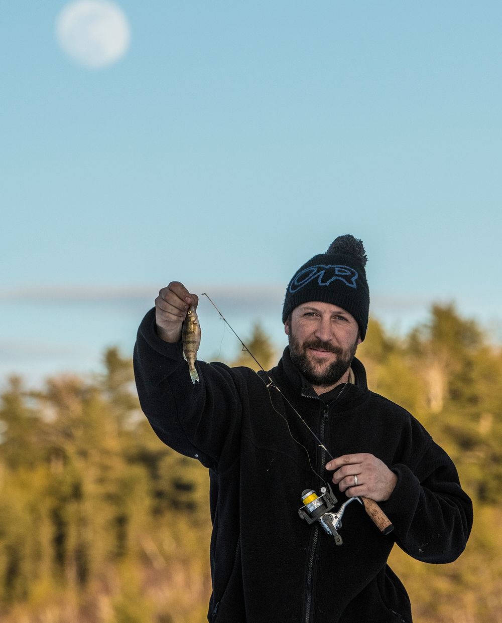 Fishermen often use snowmobile, ice auger and a depth finder to fish on Bass Lake in the U.S. Department of Agriculture…