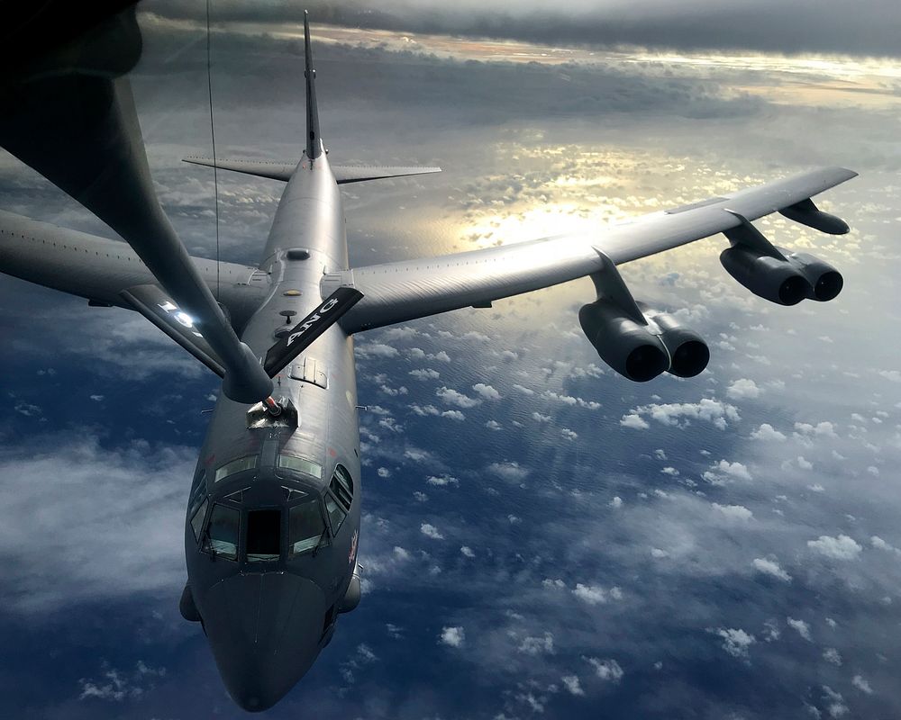 A U.S. Air Force KC-135 Stratotanker, assigned to the 506th Expeditionary Air Refueling Squadron, refuels a B-52…