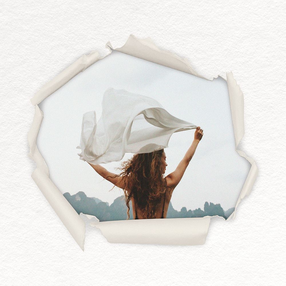 Woman holding white cloth in wind center torn paper shape badge, travel photo