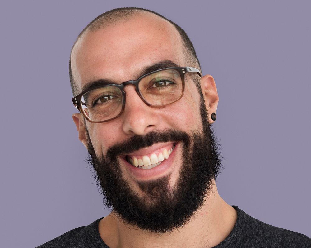 Bearded man wearing glasses portrait, smiling face close up psd
