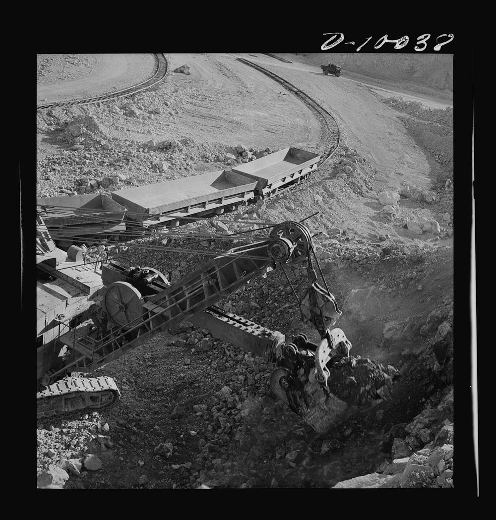 Production. Copper. Electric shovel in operation at open-cut copper mine of the Phelps-Dodge Mining Company at Morenci…