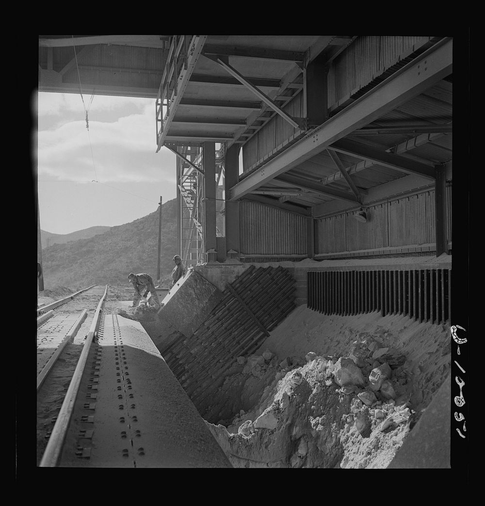 Production. Copper. Ore car dumper and grizzles at copper concentrator at the Phelps-Dodge Mining Company, Morenci, Arizona.…