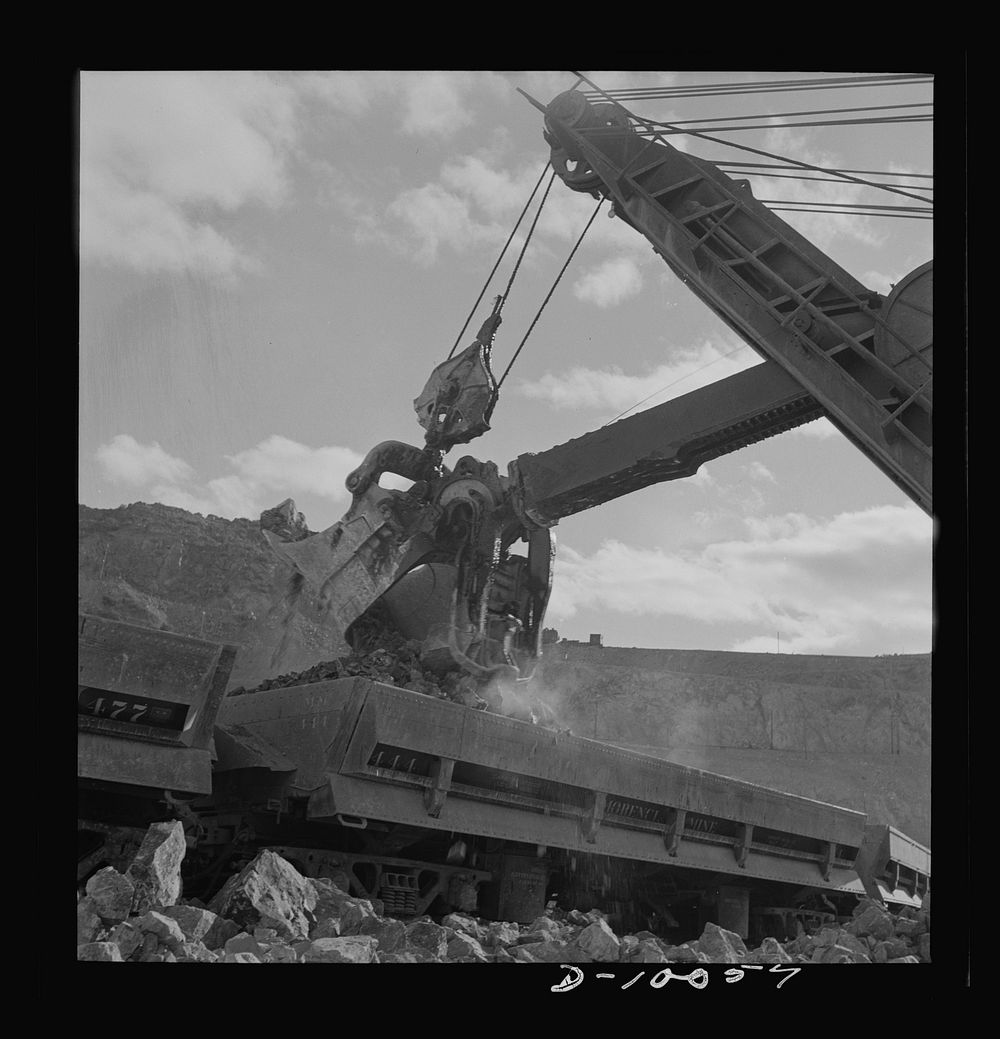 Production. Copper. Loading copper ore from an open-cut mine of the Phelps-Dodge Mining Company at Morenci, Arizona. This…