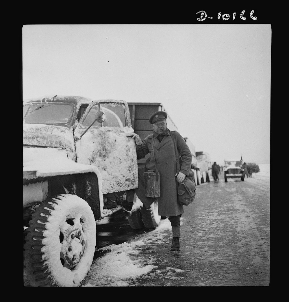 Correspondent overseas. Leon Kay, United Press war correspondent, as he gathered material for his story of U.S. Army truck…