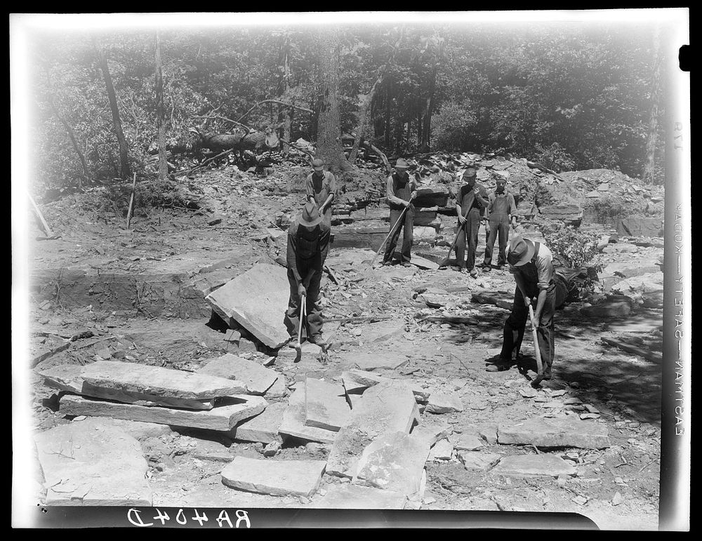 Resettled farmers working in sandstone quarry. Jackson County, Alabama. Skyline Farms. Sourced from the Library of Congress.