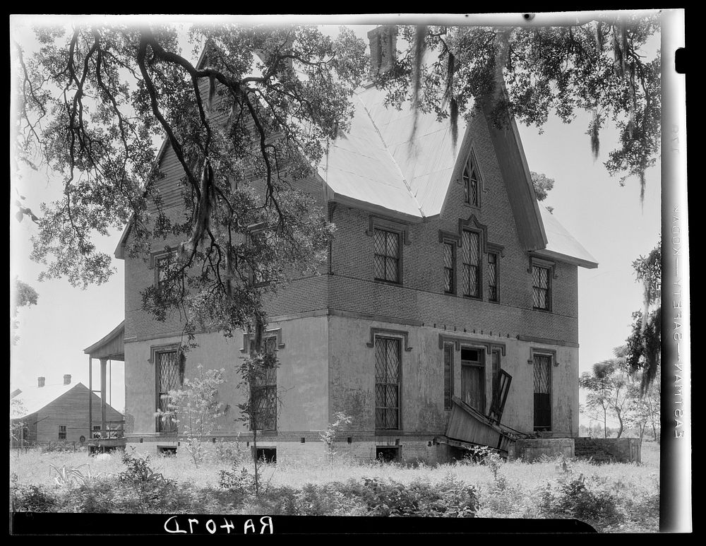 Abandoned mansion of the owner of a large sugarcane plantation. Placquemines Parish, Louisiana. Sourced from the Library of…