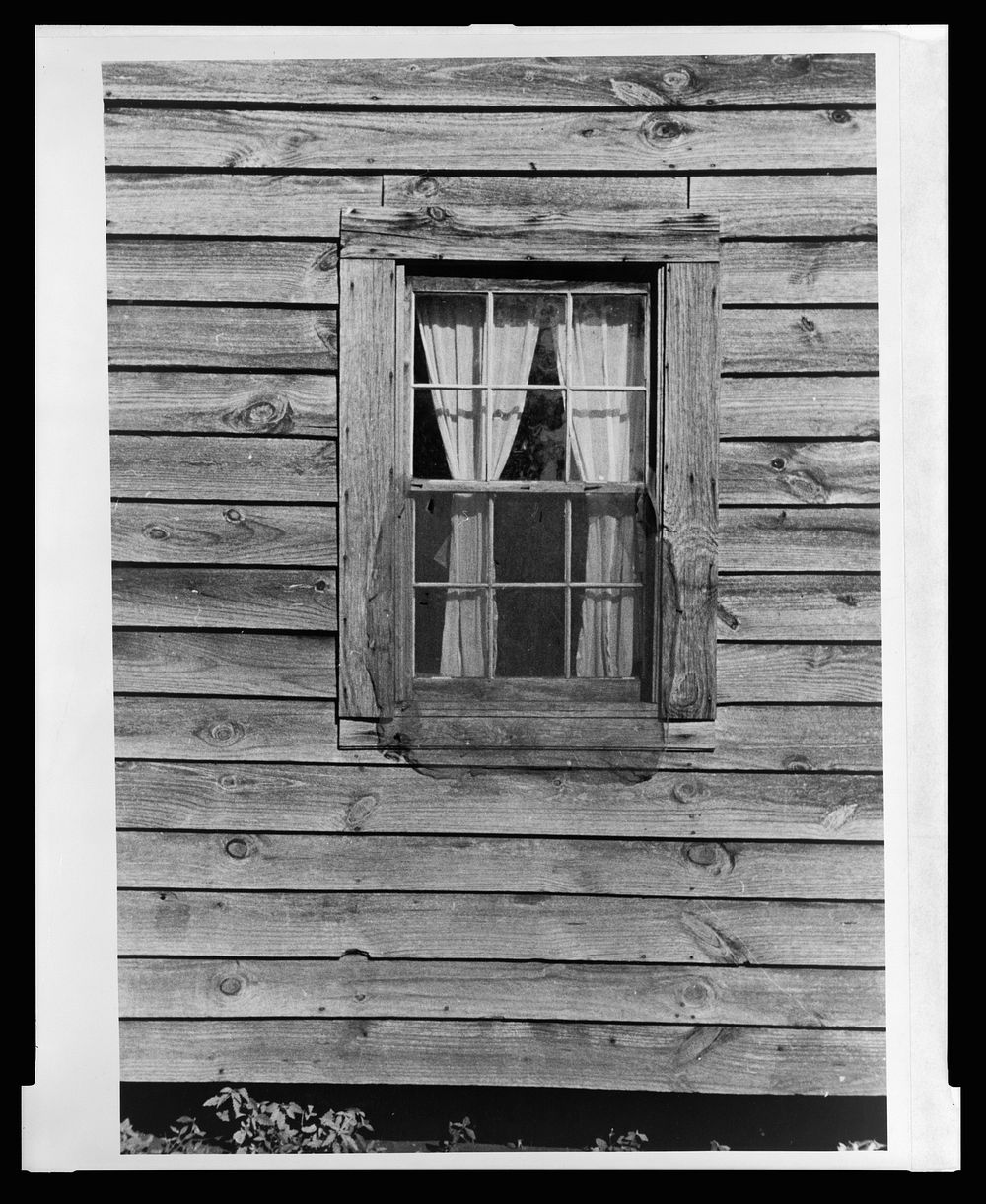 Bedroom window of Bud Fields' home, Hale County, Alabama. Sourced from the Library of Congress.