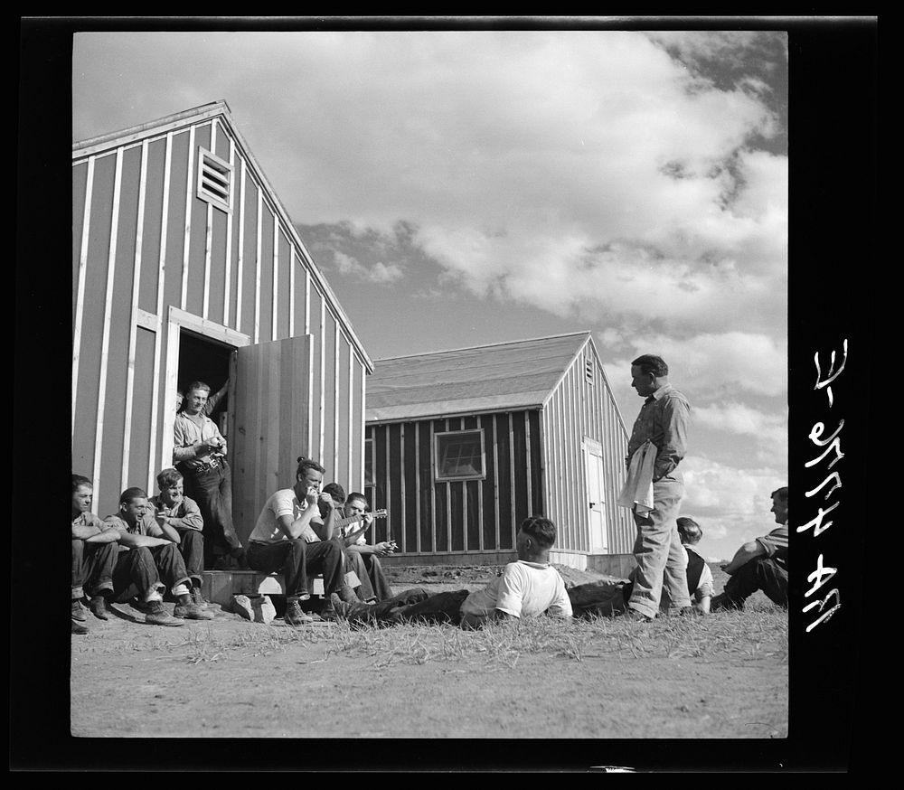 Resting after a hard day's work at a Resettlement Administration workcamp. Jefferson County, Oregon. Sourced from the…