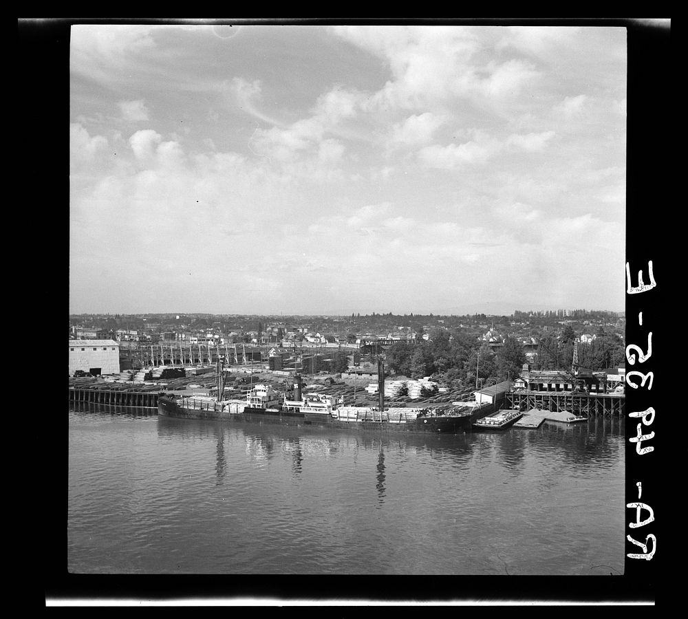 Loading lumber. Willamette River. Portland, Oregon. Sourced from the Library of Congress.