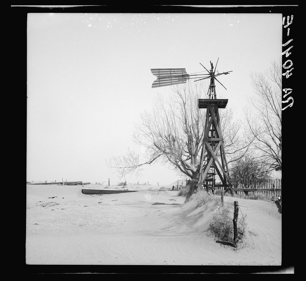 Windmill and tank on an abandoned farm. Cimarron County, Oklahoma. Sourced from the Library of Congress.