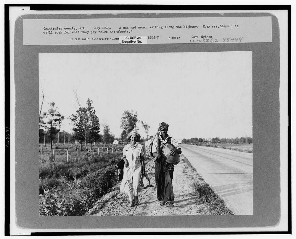 "Damned if we'll work for what they pay folks hereabouts." Crittenden County, Arkansas. Cotton workers on the road, carrying…