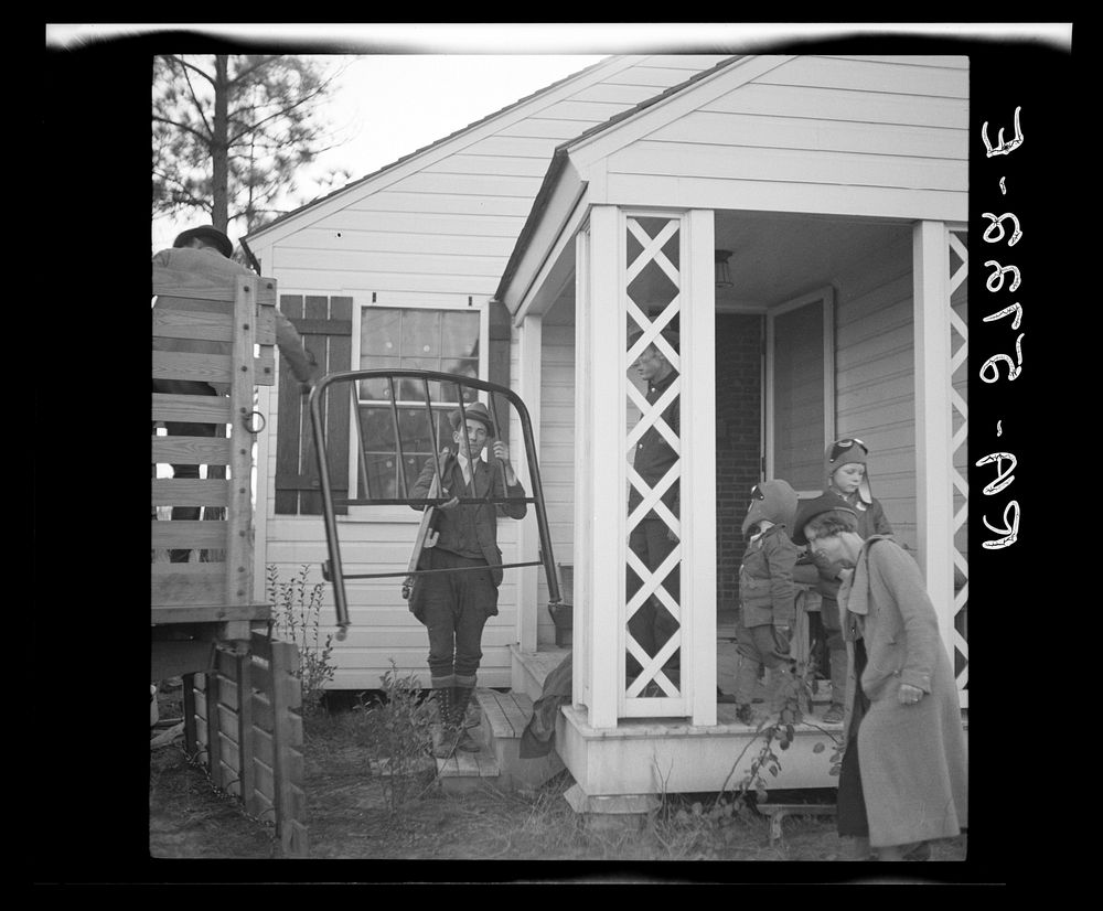 W.R. Hubbard and family moving into their new home on the Penderlea Homesteads, North Carolina. Sourced from the Library of…