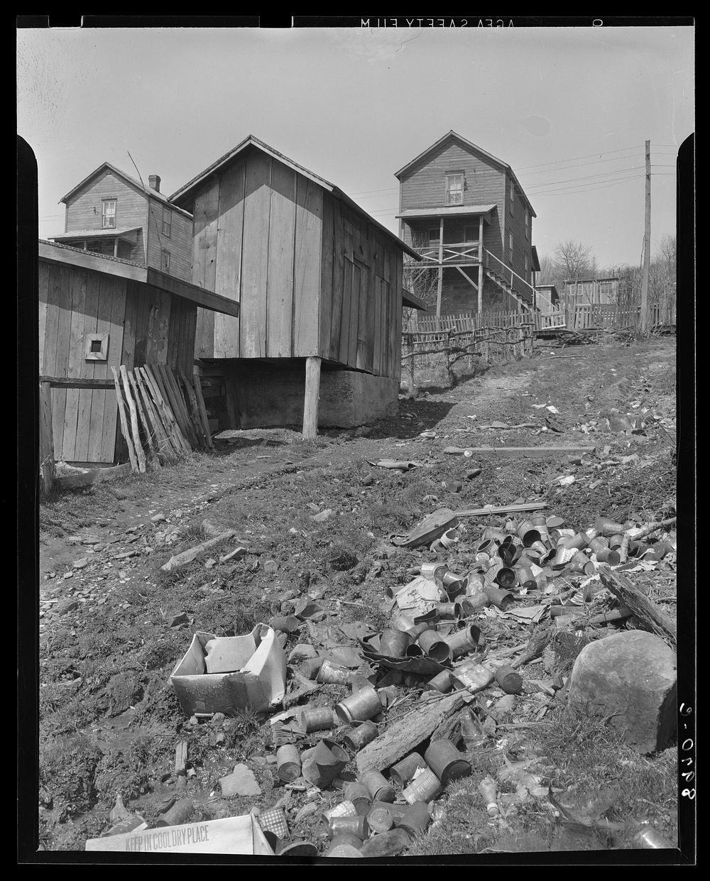 Refuse heap behind company houses. Kempton, West Virginia. Sourced from the Library of Congress.