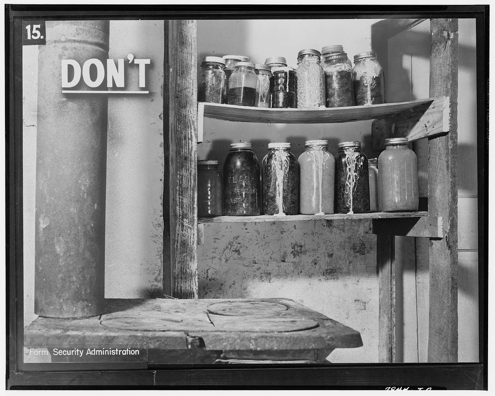 This is a poor place to keep canned foods. The jars are too near the stove. Sourced from the Library of Congress.