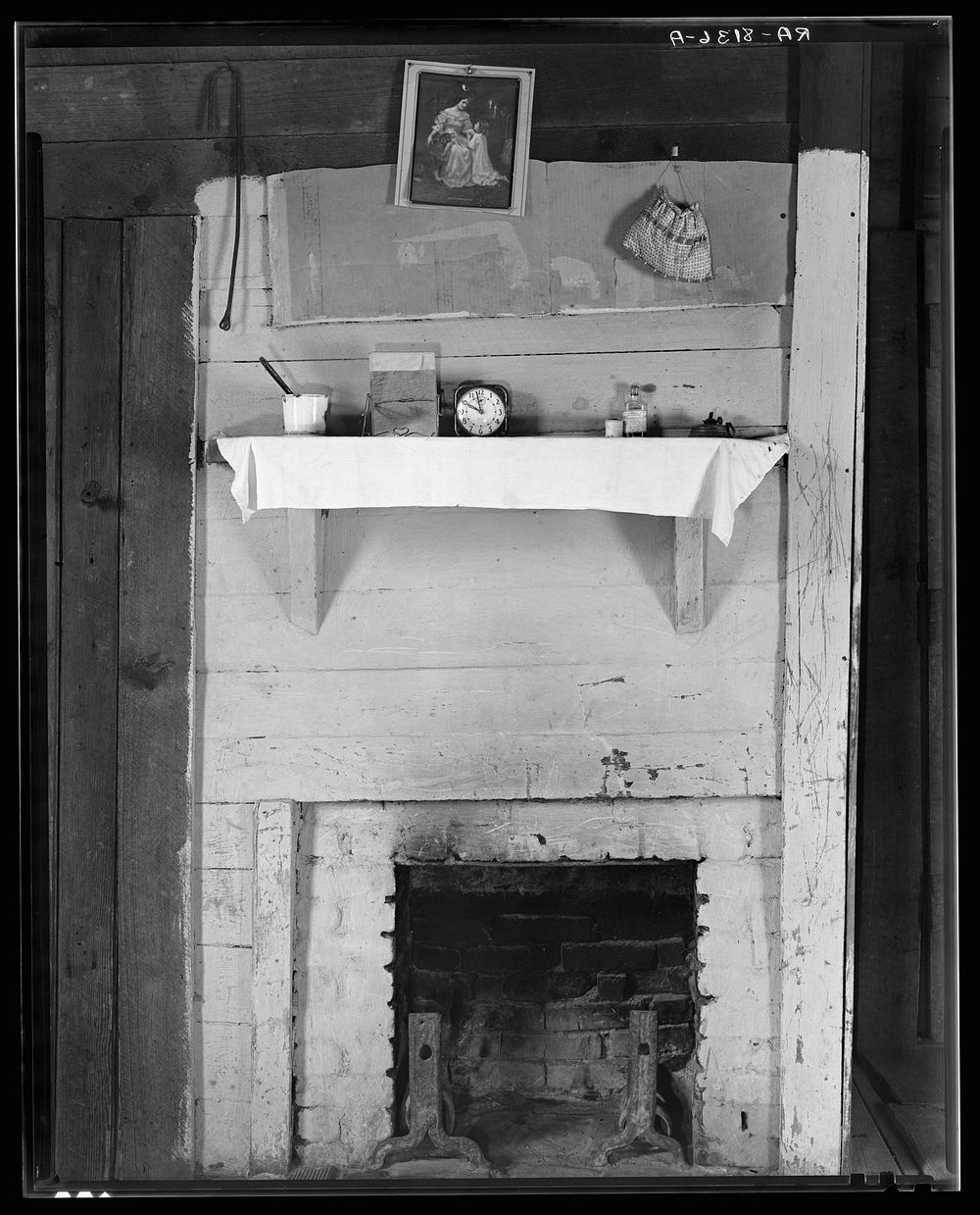 Fireplace in bedroom of Floyd Burroughs' cabin. Hale County, Alabama. Sourced from the Library of Congress.