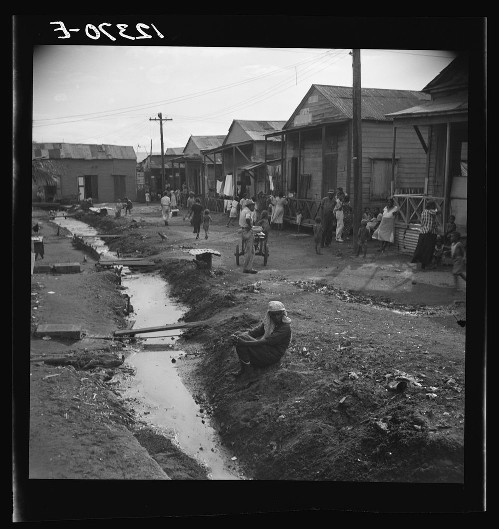 Street and open sewer in the workers' quarter of Porta De Tierra. San Juan Puerto Rico. Sourced from the Library of Congress.