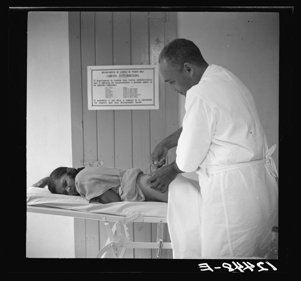 Anti-malarial injection in a P.R.R.A. (Puerto Rico Resettlement Administration) health center. San Juan, Puerto Rico.…