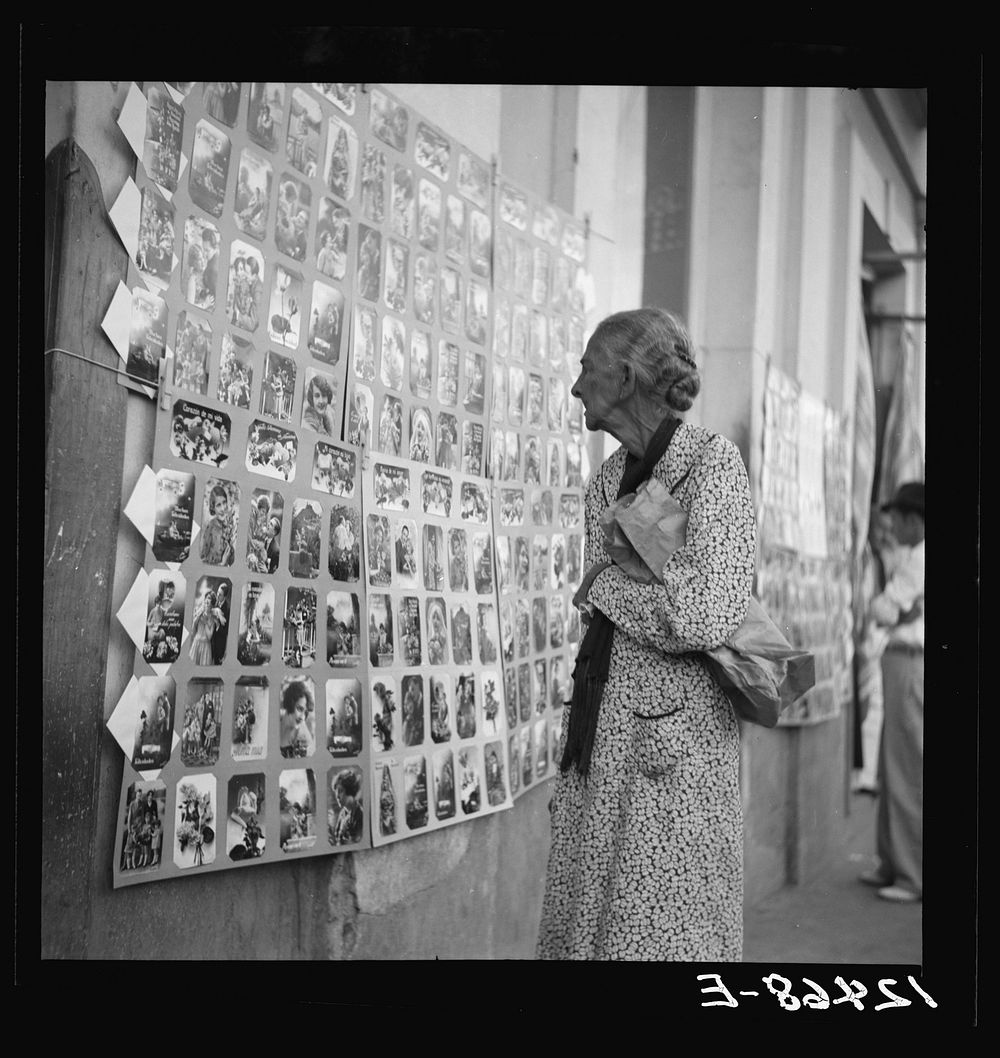 Postcards for sale near the market. San Juan, Puerto Rico. Sourced from the Library of Congress.