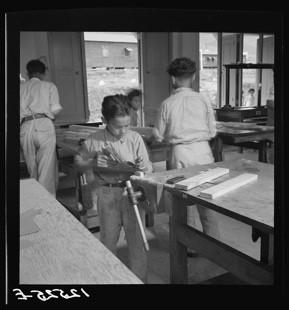 Class in carpentry for resettlers' children. La Plata project. Puerto Rico. Sourced from the Library of Congress.