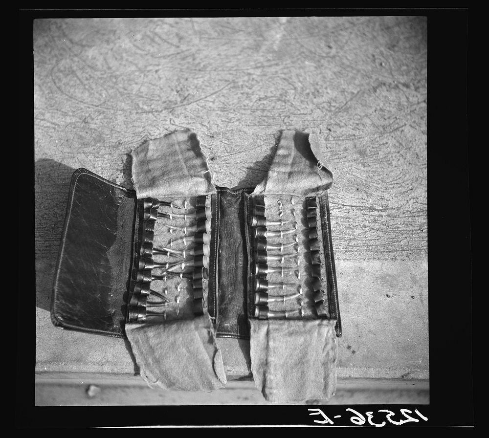 A gentleman's wallet containing metal spurs for fighting cocks. Puerto Rico. Sourced from the Library of Congress.