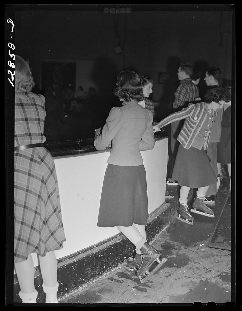 Chevy Chase Ice Palace, Washington. D.C. Skaters resting. Sourced from the Library of Congress.