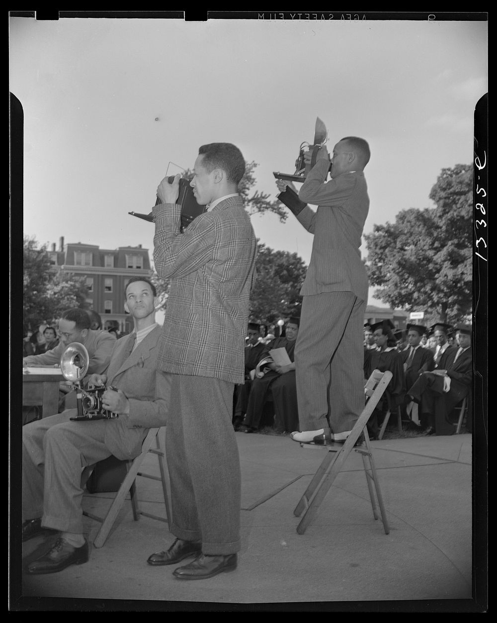 Washington, D.C. Photographers from the  press at Howard University commencement exercises. Sourced from the Library of…