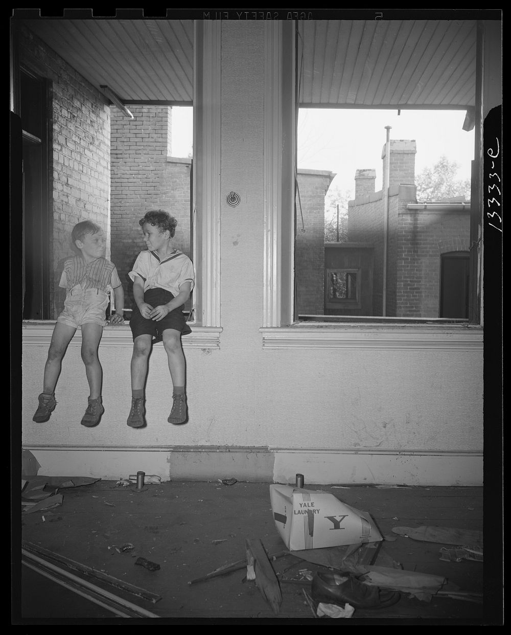 Washington, D.C. Children playing in wrecked houses along Independence Avenue. Sourced from the Library of Congress.