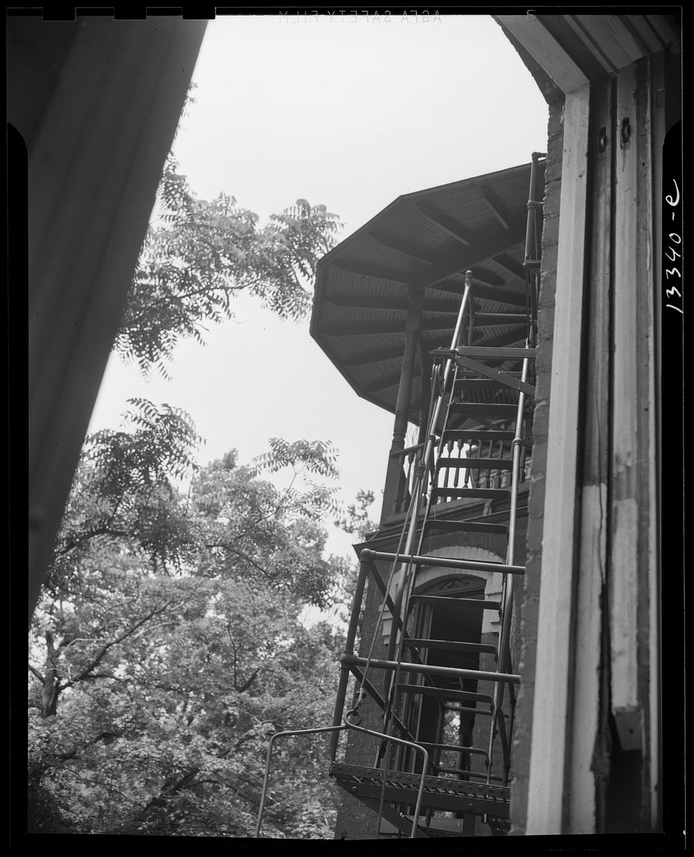 Washington, D.C. Balcony of house being wrecked on Independence Avenue. Sourced from the Library of Congress.