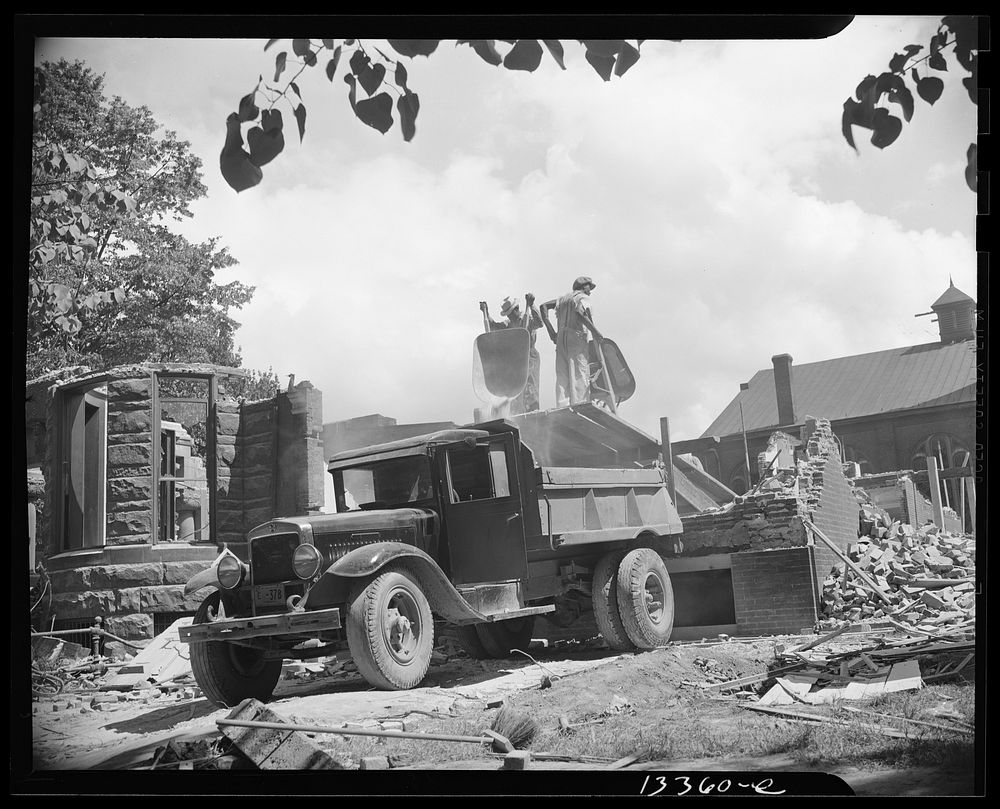 Washington, D.C. Loading debris from wrecked buildings along Independence Avenue. Sourced from the Library of Congress.
