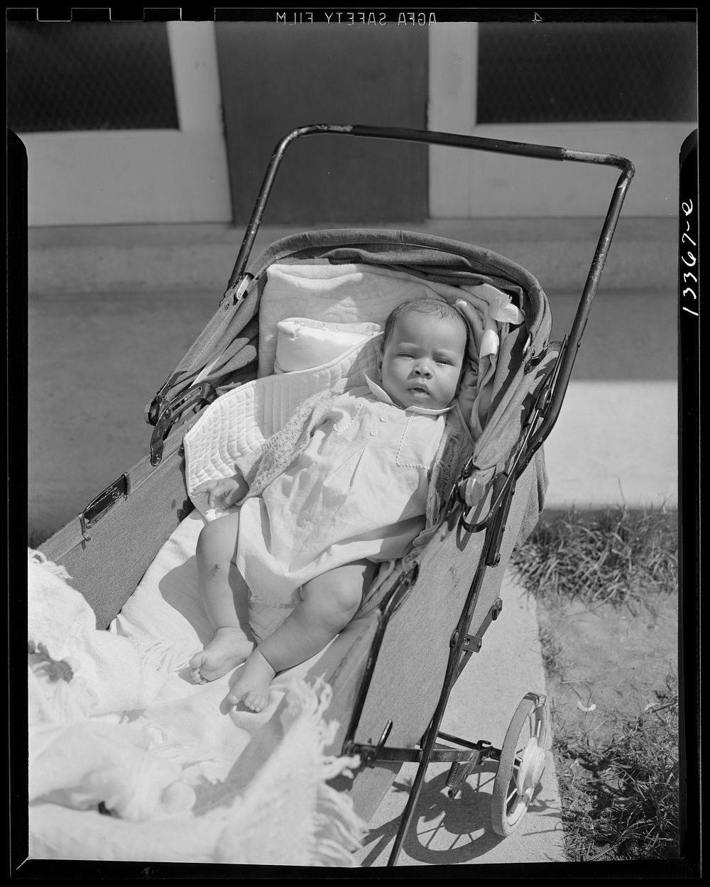 Anacostia, D.C. Frederick Douglass housing project. Baby taking a sun bath. Sourced from the Library of Congress.