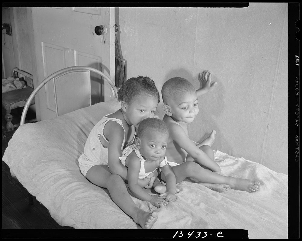 Washington, D.C. Grandchildren of Mrs. Ella Watson, a government charwoman. Sourced from the Library of Congress.