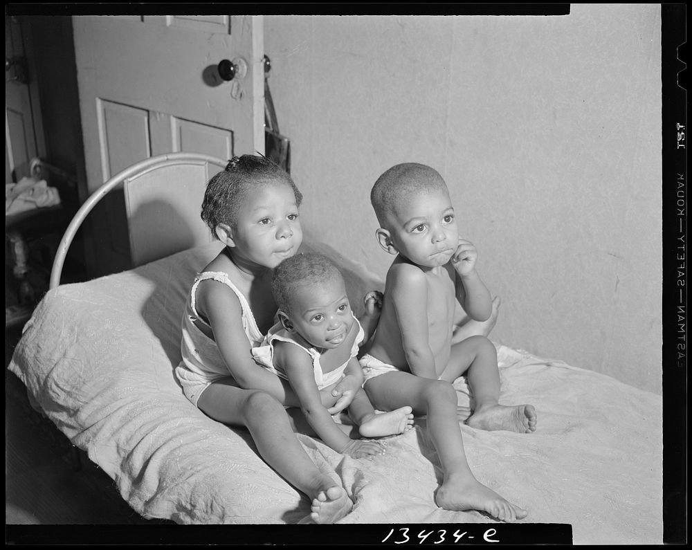 Washington, D.C. Grandchildren of Mrs. Ella Watson, a government charwoman. Sourced from the Library of Congress.