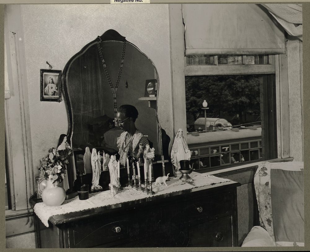 Washington, D.C. Dresser in the bedroom of Mrs. Ella Watson, a government charwoman. Sourced from the Library of Congress.